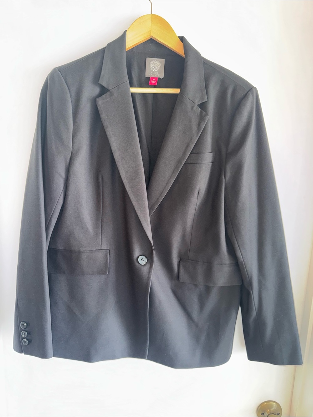 Vince Camuto black single-button blazer.